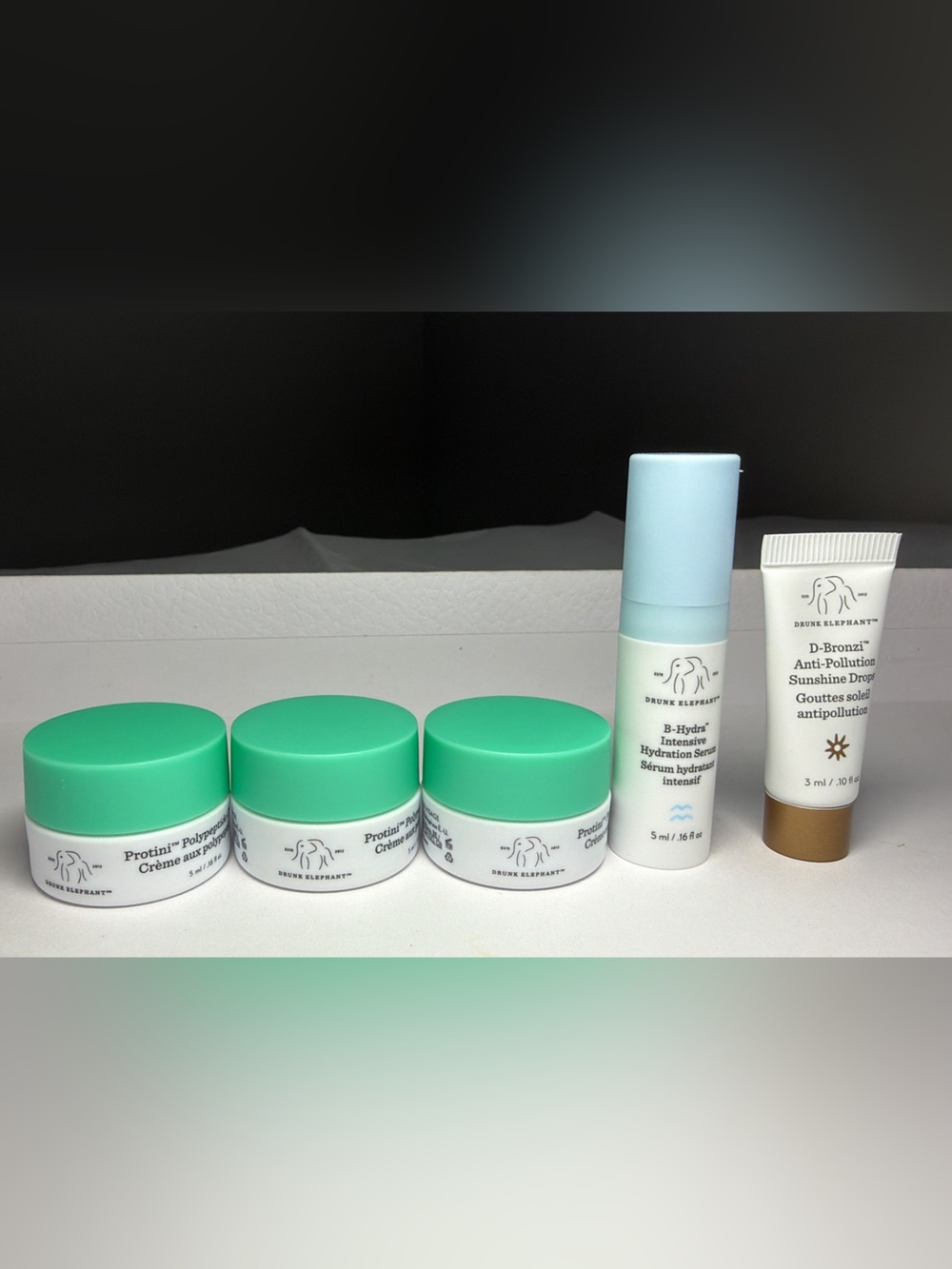 New, unused Drunk Elephant Mini skinc@re Jars set